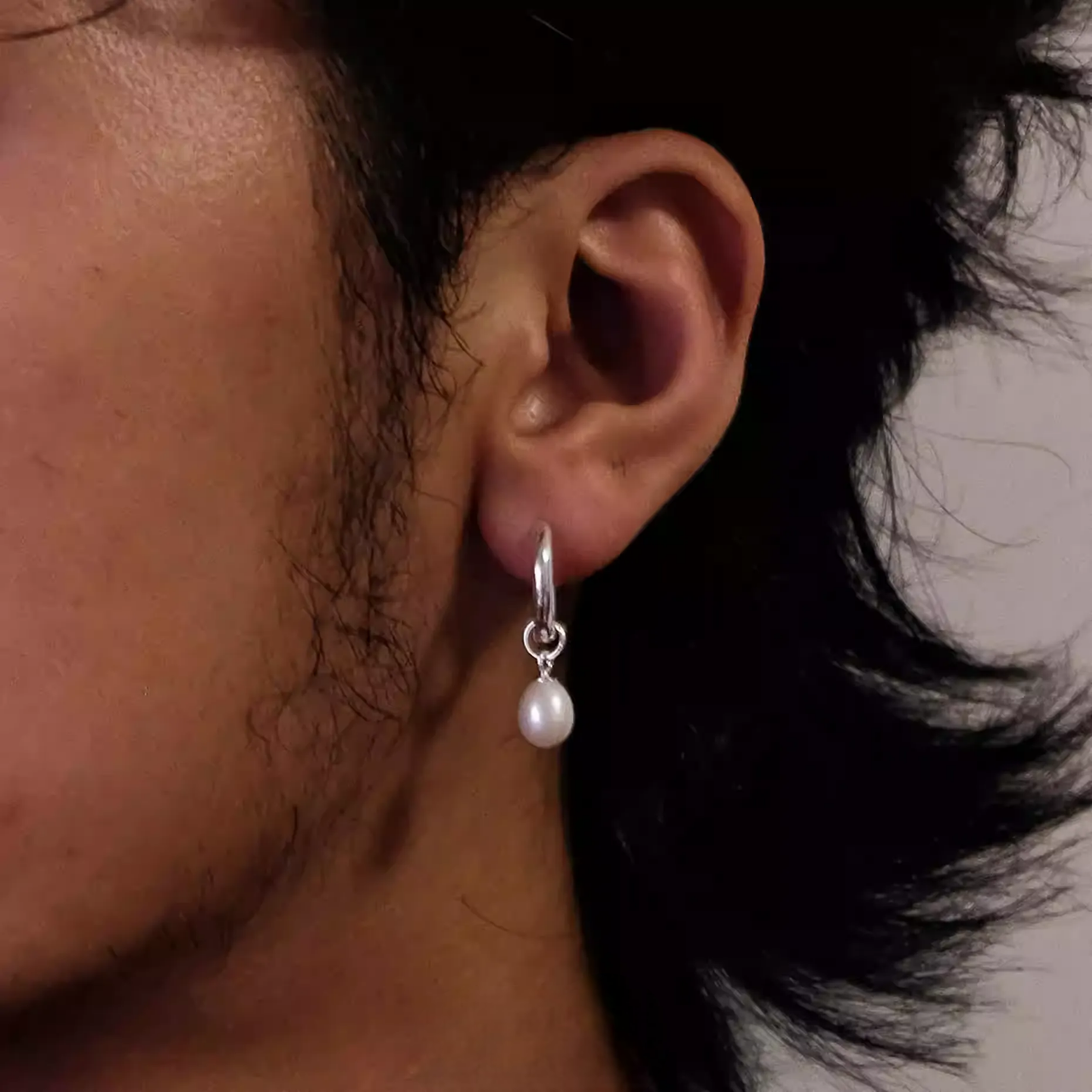 925 Sterling Silver Pearl Charm Hoops Elegant Pearl Drop Earrings with delicate pearl dangle on polished silver hoop worn on ear