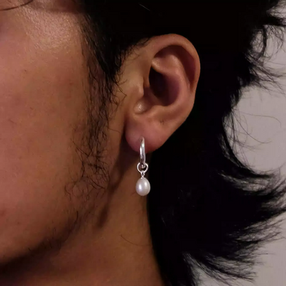 925 Sterling Silver Pearl Charm Hoops Elegant Pearl Drop Earrings with delicate pearl dangle on polished silver hoop worn on ear