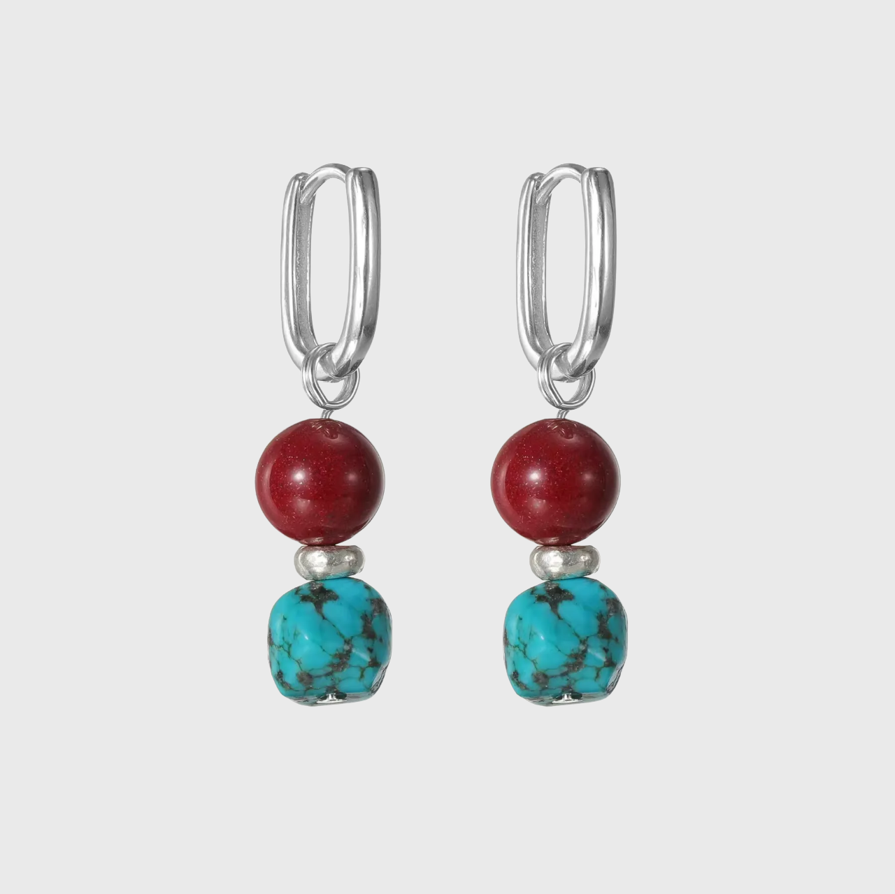 Silver rectangular hoop earrings with red cinnabar and raw turquoise beads.