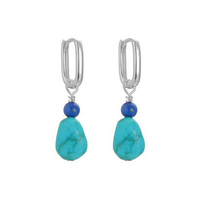 Silver hoop earrings with blue lapis lazuli and raw turquoise drops.