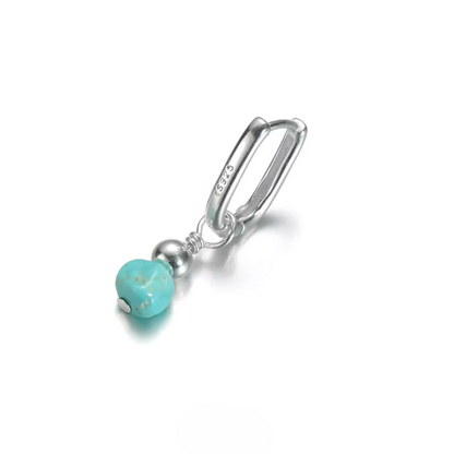 Single S925 silver rectangular huggie earring with a raw turquoise drop.