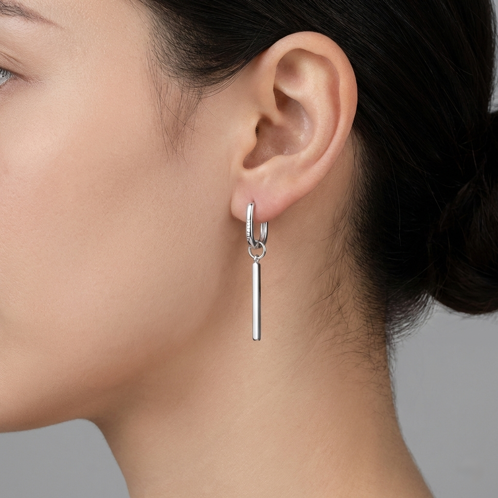 Silver Rectangular Huggie Hoops with Bar Dangle Sleek Geometric Studs worn on ear with clean modern design