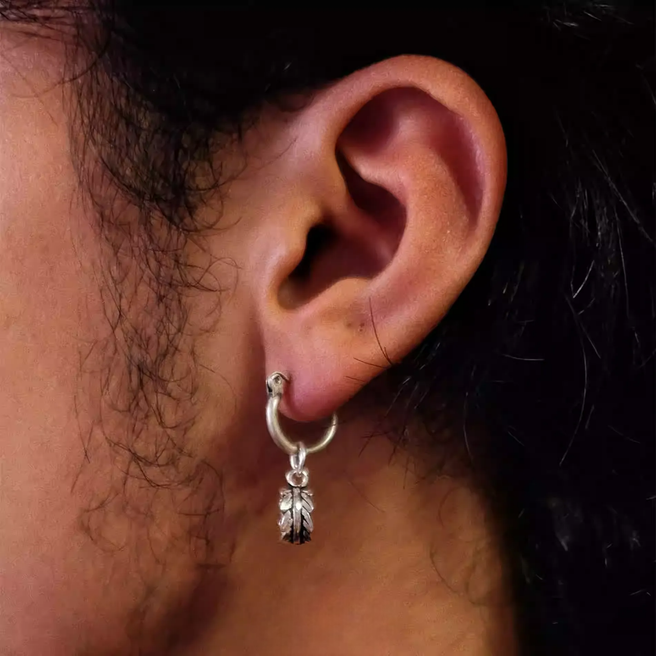 Vintage 925 Silver Leaf Charm Hoops Oxidized Feather Drop Earrings worn on ear showing delicate oxidized silver leaf charm